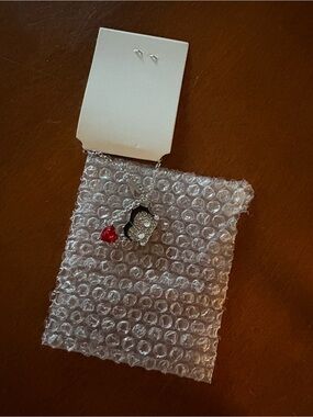 Silver-tone Rhinestone Pendant Necklace with Red Crystal Accent